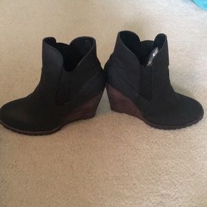 Black leather wedge booties